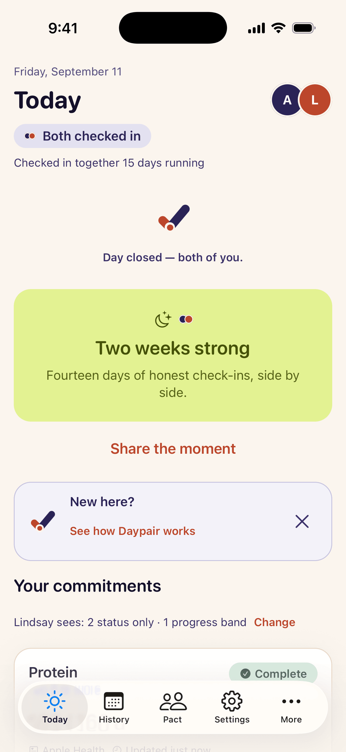 Today screen: both checked in, day closed for both, a "Two weeks strong" together milestone